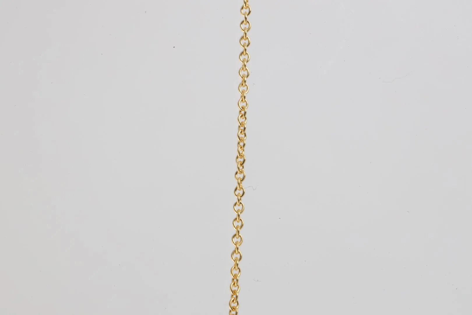 16" Tiffany & Co. 18k Yellow Gold Diamond Signature X Pendant Necklace (4.56g.)