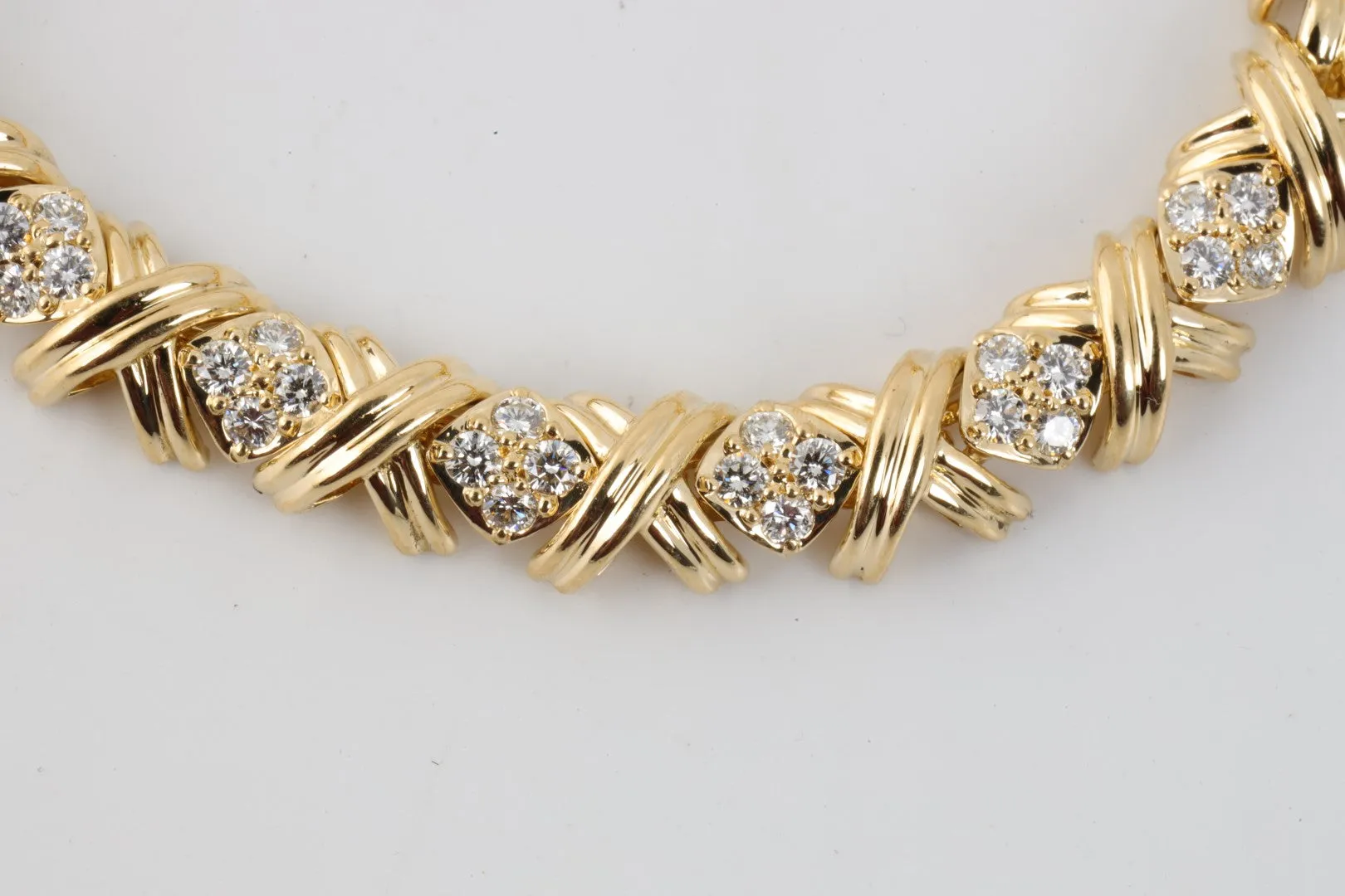 7" Tiffany & Co. 18k Yellow Gold Diamond Signature X Link Bracelet (29.19g.)