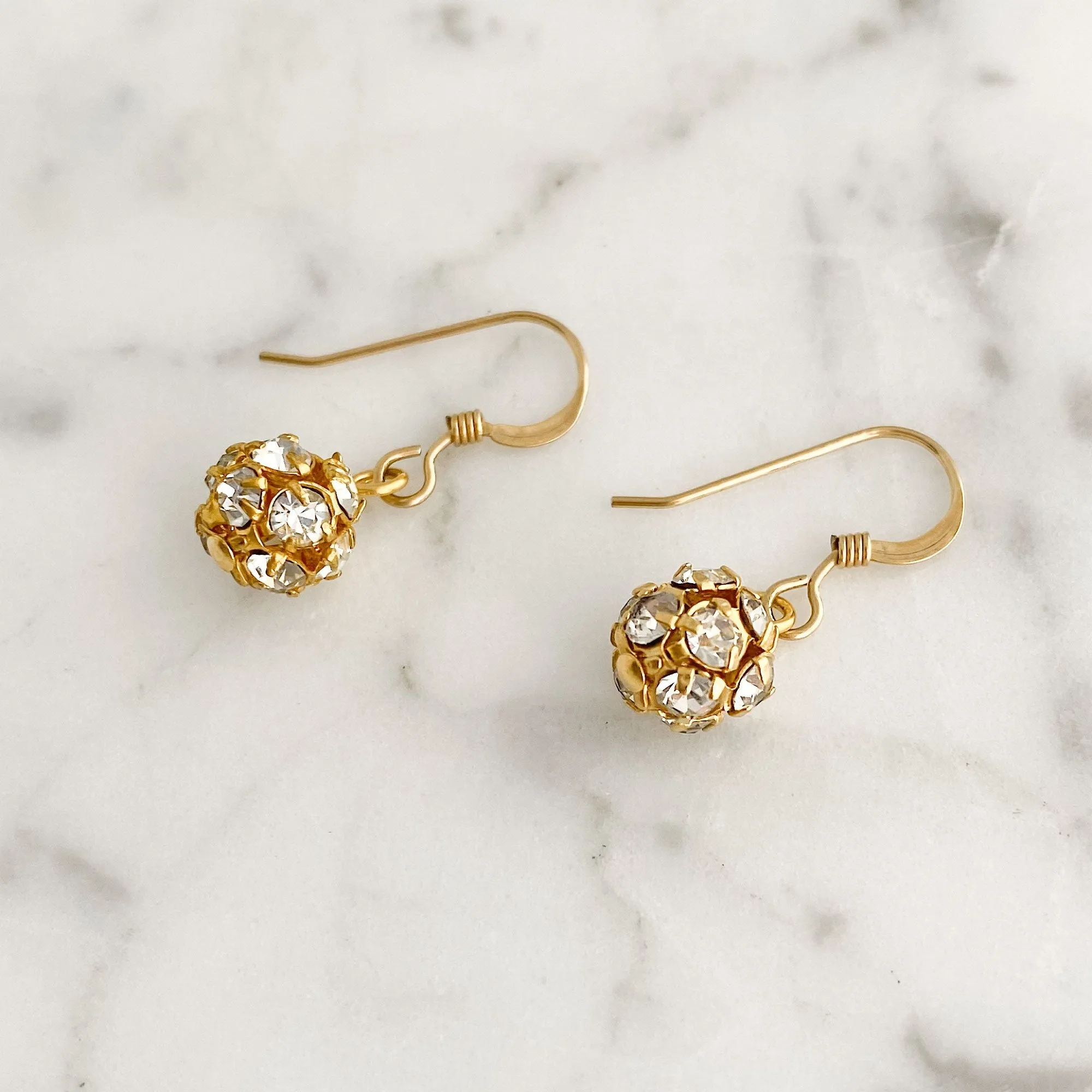 LOLA gold rhinestone ball earrings