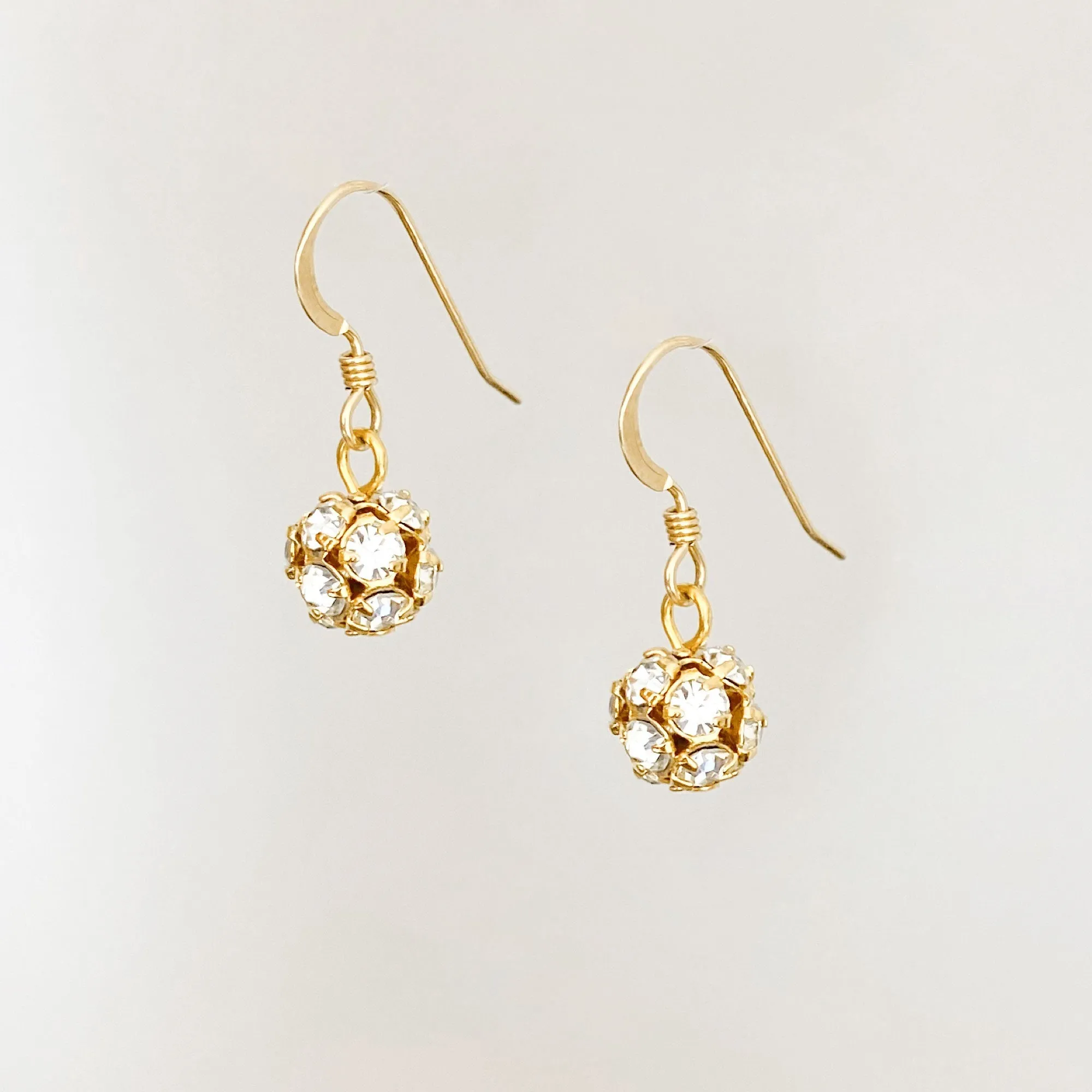 LOLA gold rhinestone ball earrings